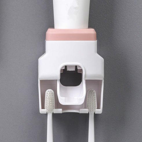 Automatic toothpaste squeezing toothbrush holder